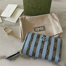 Gucci Striped Wallets