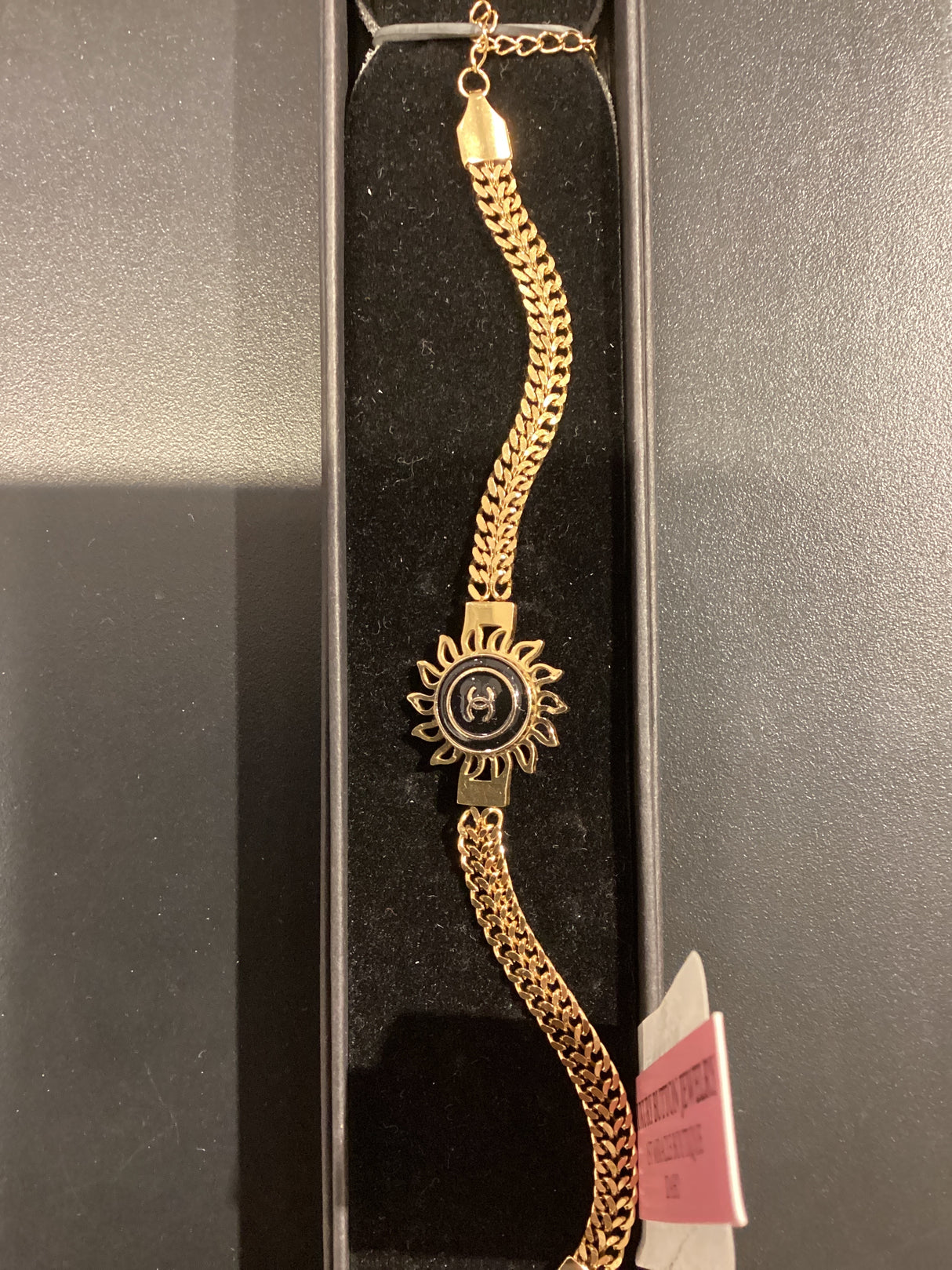 22D BRACELET C BUTTON BLK/GLD SUN STEEL